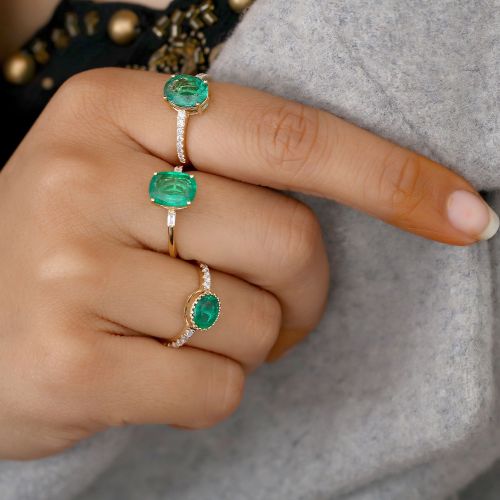 Diamond & Oval Emerald Ring