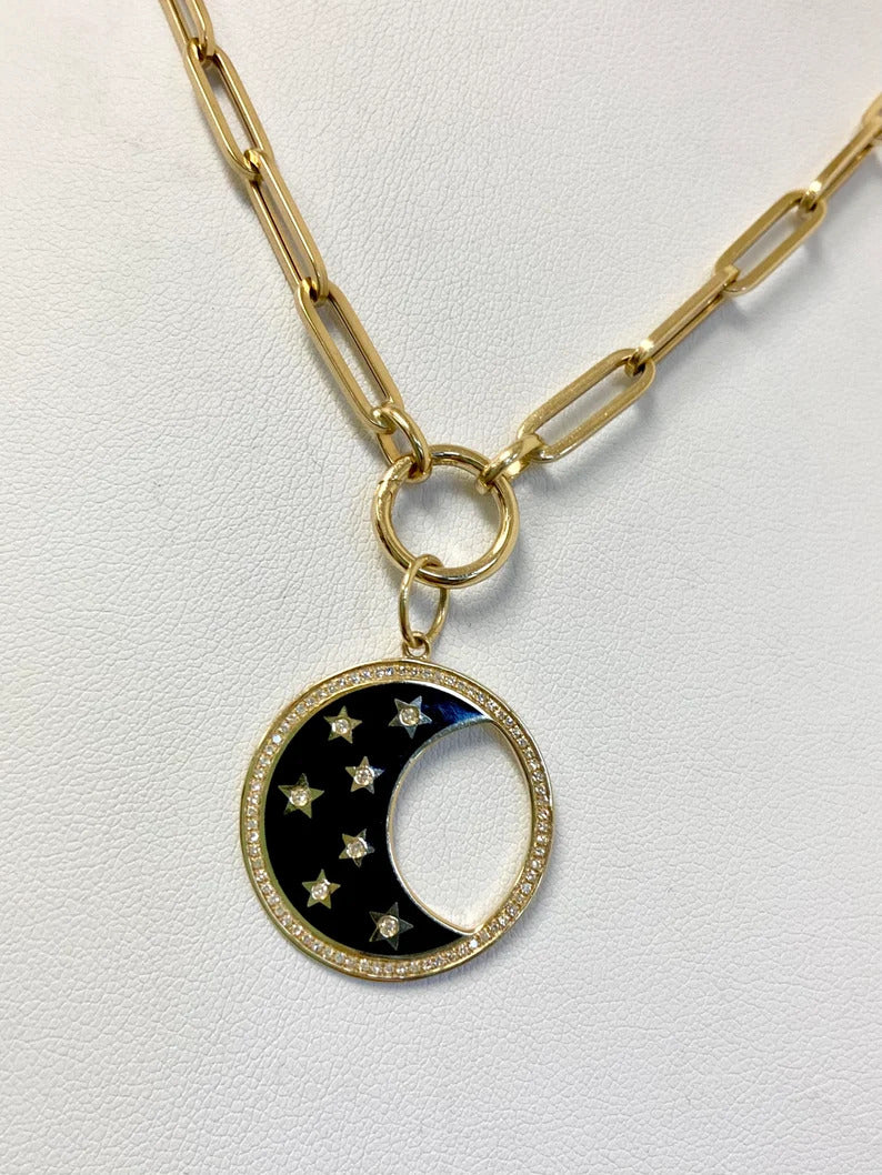 round gold clasp with moon charm