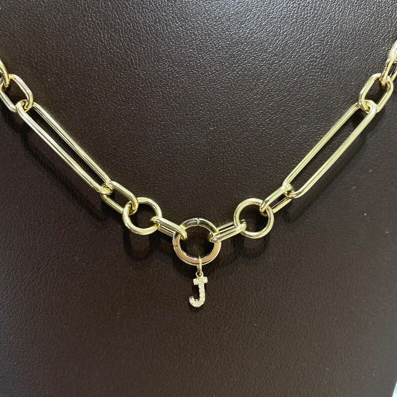 golden smooth round clasp in a chain
