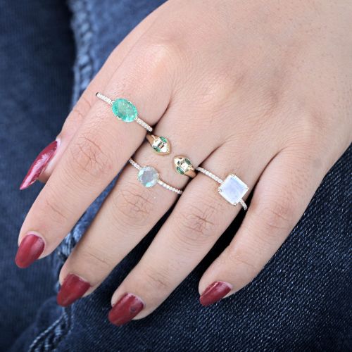 Oval Form 6x8 Blue Topaz Ring in Size 6
