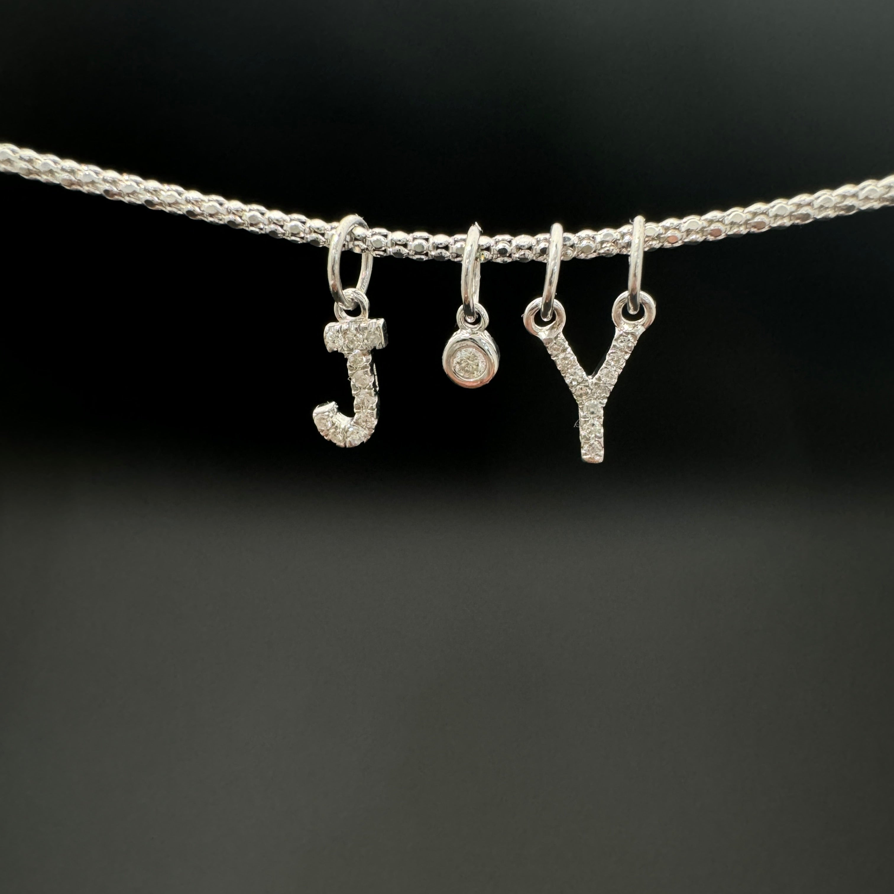 "V" Diamond Charm