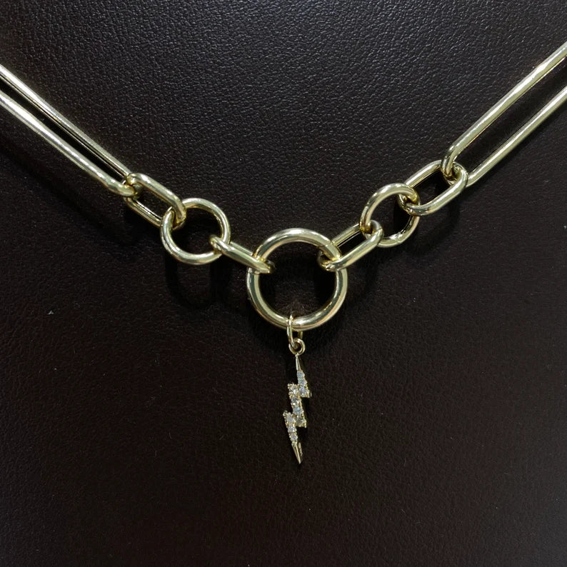 Lighting charm in gold chain loop
