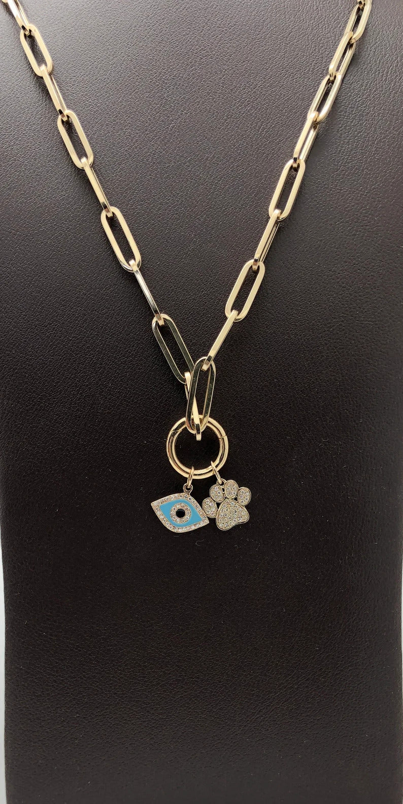 Round gold clasp with charms 